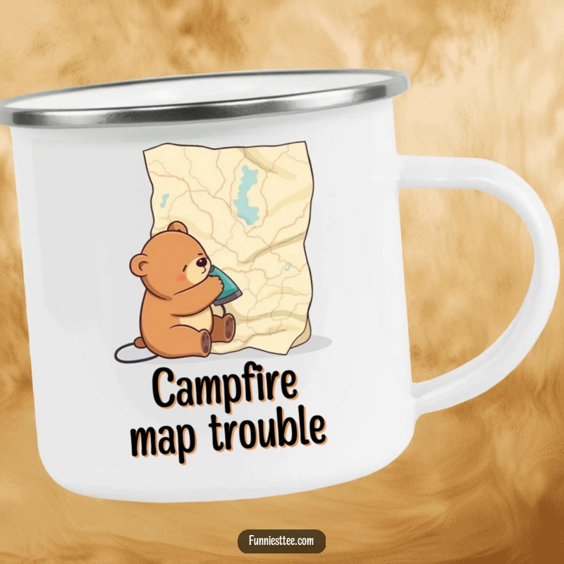 Funny camping mug featuring a sleepy bear ironing a large map, ready for cozy mornings by the campfire.