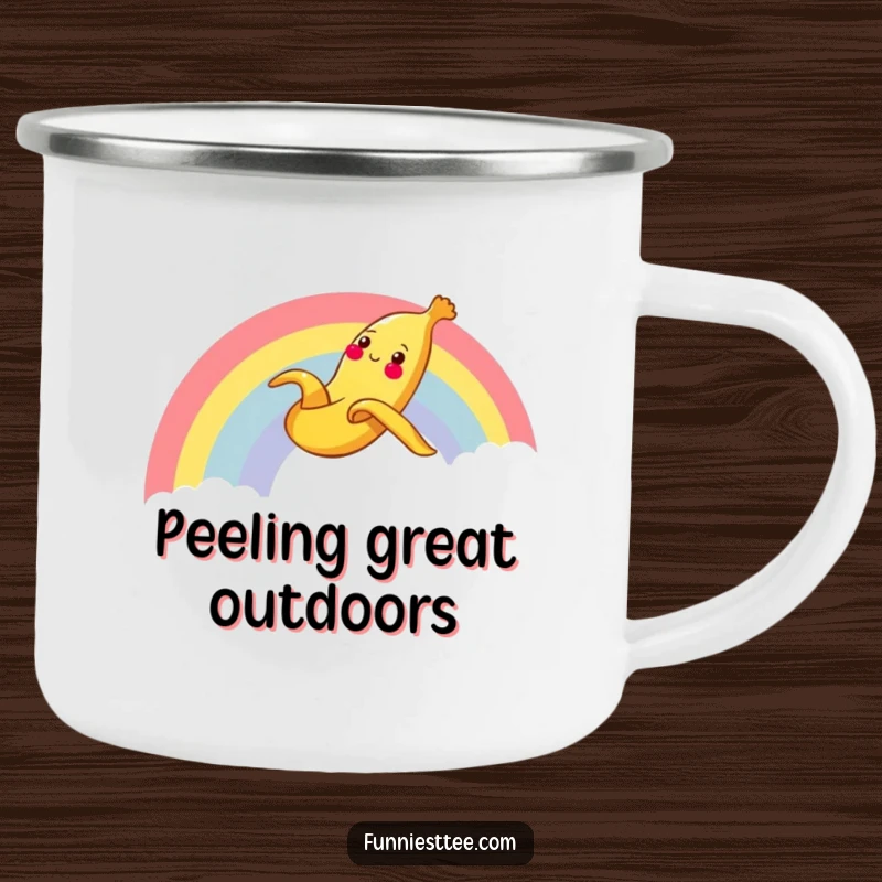 Funny Banana Rainbow Camping Mug featuring a cheerful banana peel sliding gleefully down a rainbow, designed for outdoor use and humorous enjoyment.
