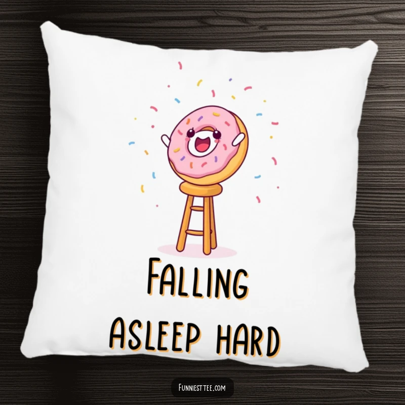 Plush funny pillow showing a cheerful donut character falling off a stool with sprinkles flying, great for lounging.