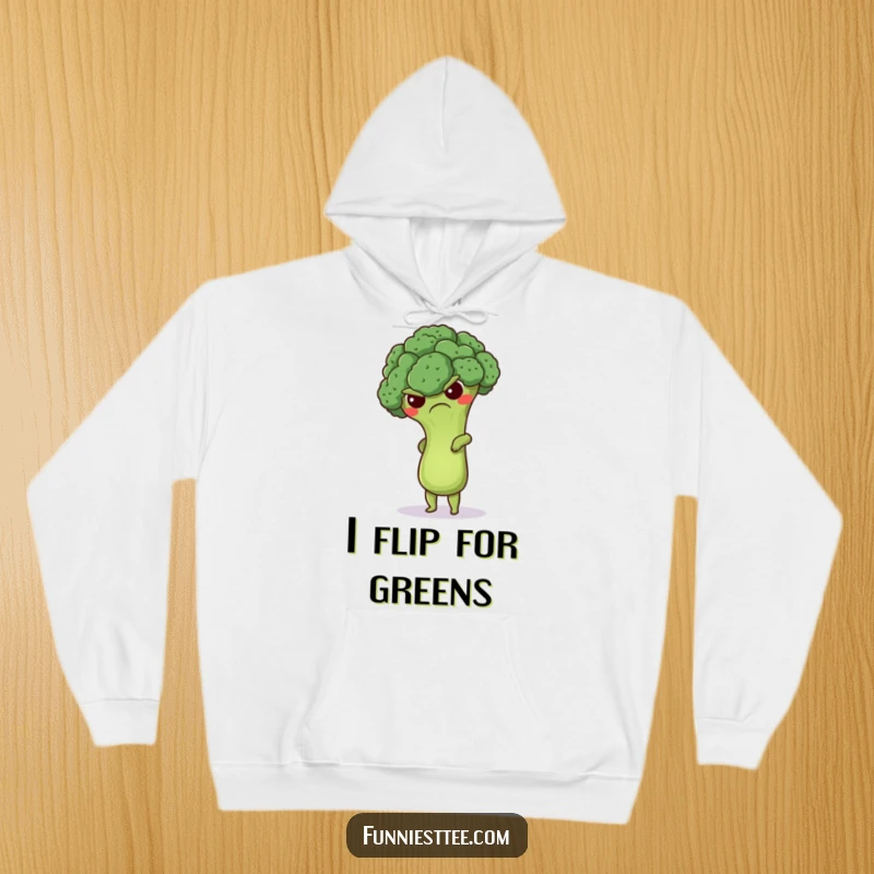 Funny grumpy broccoli hoodie featuring a cute floret attempting a handstand, offering warm, humorous comfort for fitness enthusiasts.