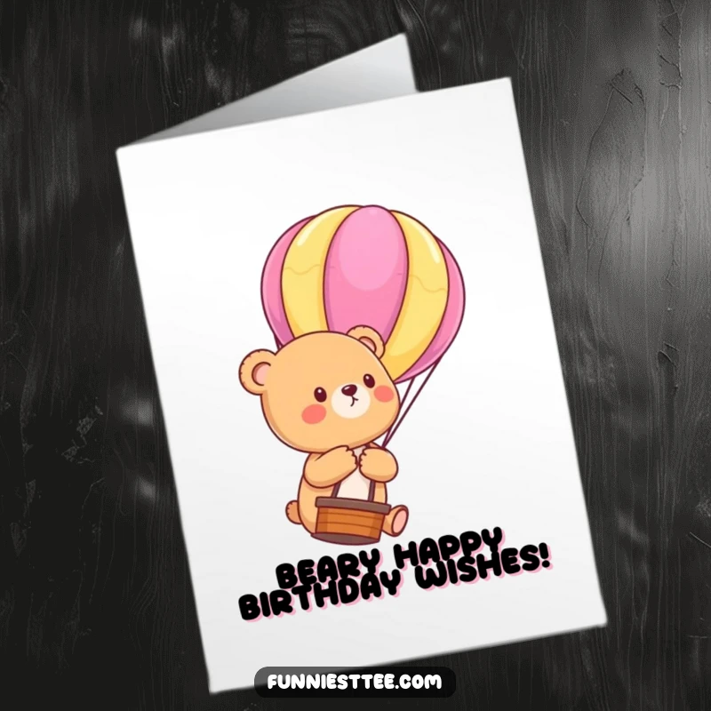 Funny Free Printable Birthday Card: A cute bear cub drifts upwards, holding a hot air balloon string.