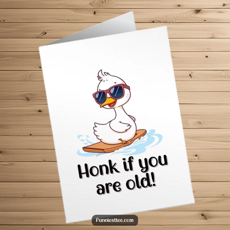 Funny Free Printable Birthday Card: A cool goose in sunglasses waterskis backwards, exuding hilarious, carefree vibes.