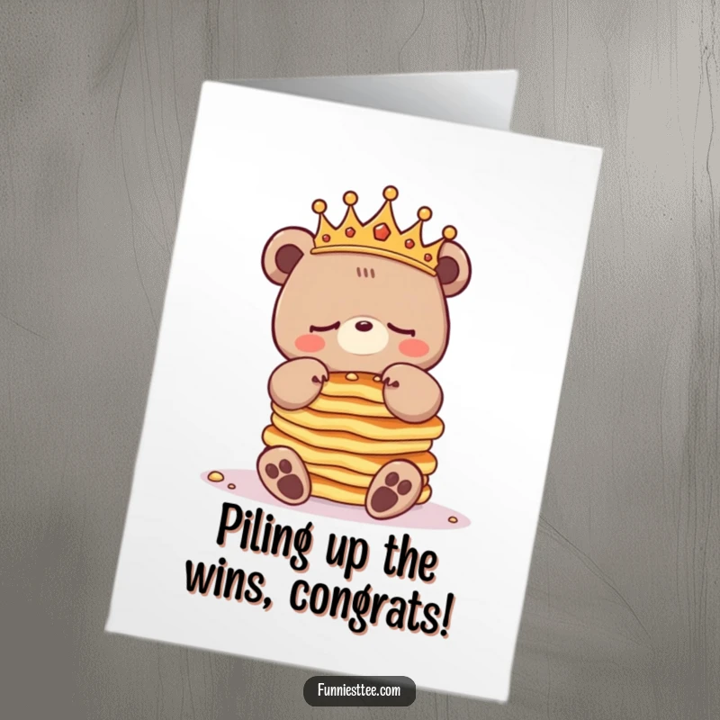 Funny Free Printable Congratulations Card: A sleepy bear with a crown juggles pancakes, celebrating success.