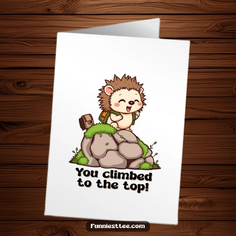 Funny Free Printable Congratulations Card: Tiny hedgehog with backpack climbing a rock, celebrating reaching new heights with excitement.
