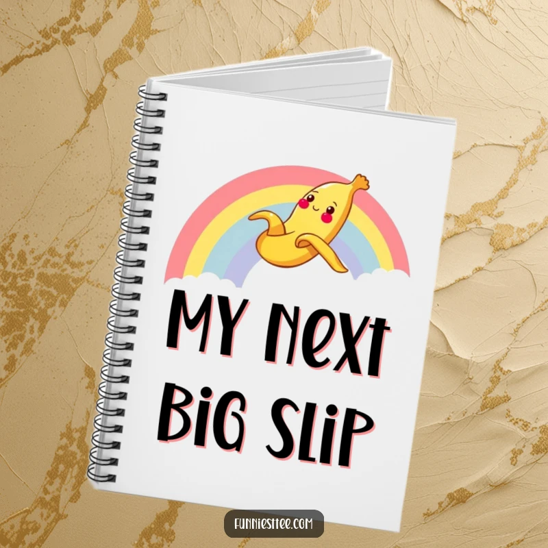 Funny Banana Rainbow Notebook with a cheerful banana peel sliding gleefully down a rainbow, ideal for jotting down notes with a humorous touch.