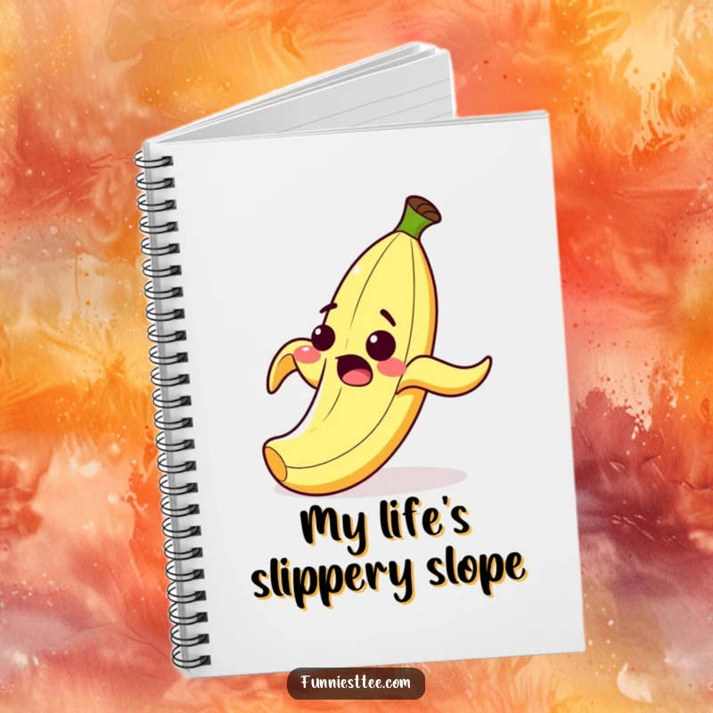 Funny notebook with a surprised cartoon banana peel grinning as it comically slips on its own peel, perfect for jotting down jokes.