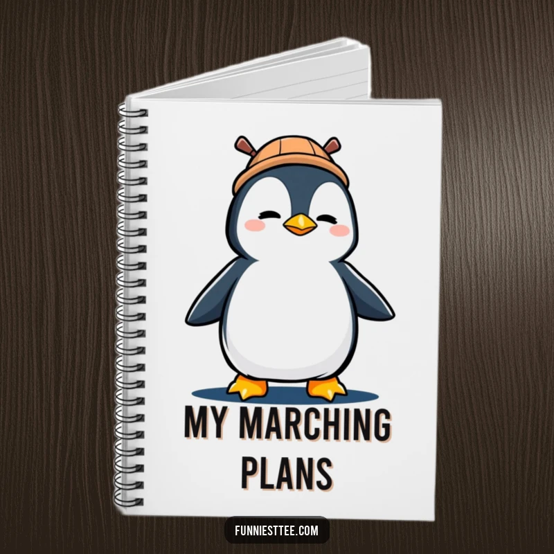Funny notebook cover with a determined penguin in a propeller hat, marching with gusto.