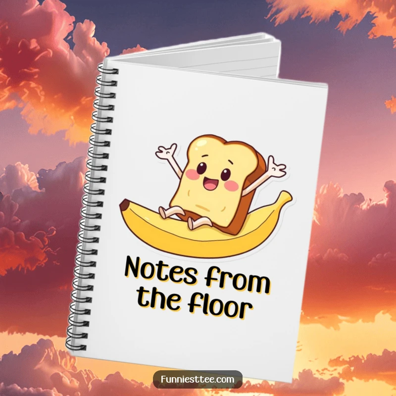 Funny notebook with a slice of toast character with arms flailing as it slides down a banana peel on the cover.