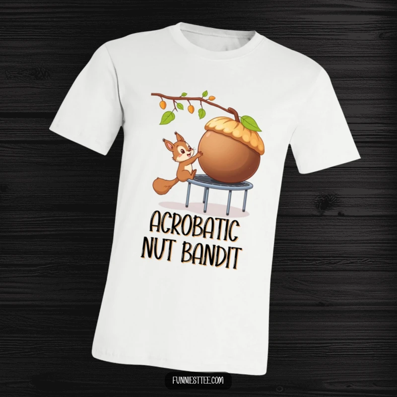 Funny t-shirt showing a sly squirrel bouncing on a trampoline towards a massive acorn, capturing a moment of sneaky ambition.