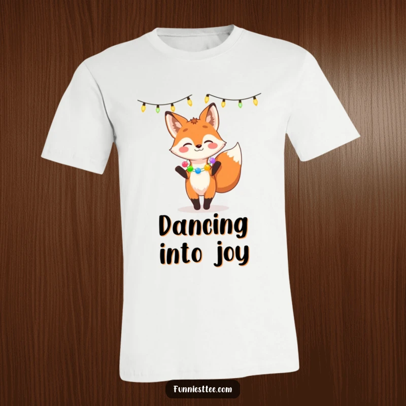 Funny t-shirt featuring a giggling fox in a garland dancing exuberantly under a string of lights, radiating festive happiness and playful energy.
