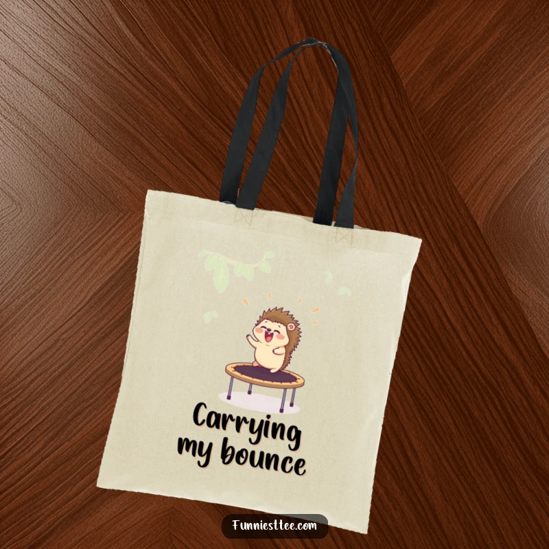Funny tote bag depicting a hedgehog flying off a trampoline, a whimsical and amusing accessory for carrying everyday items.