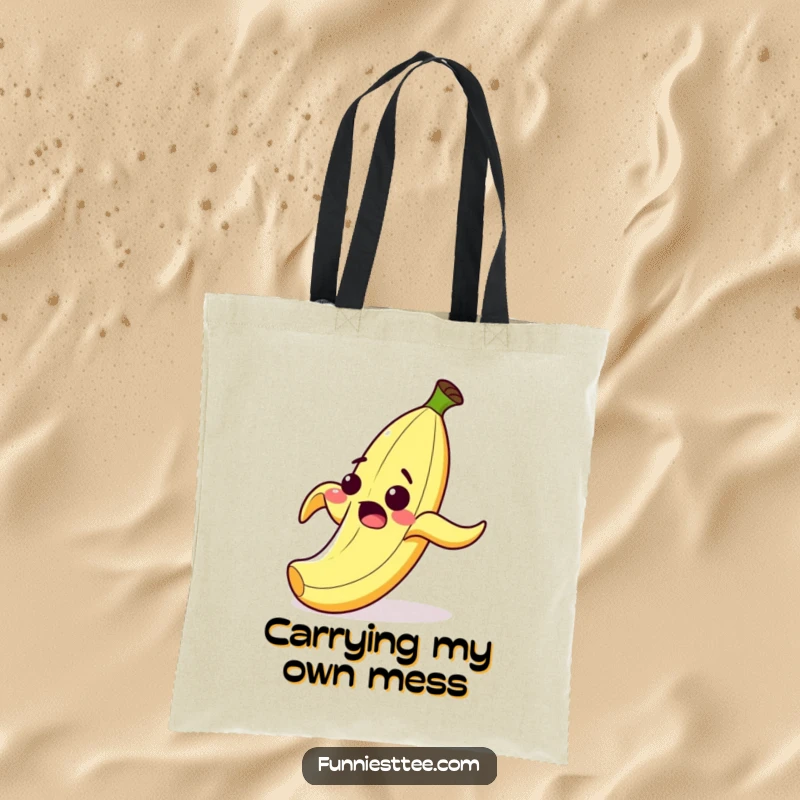 Funny tote bag featuring a surprised cartoon banana peel with a wide grin, comically slipping on its own peel, a humorous accessory.