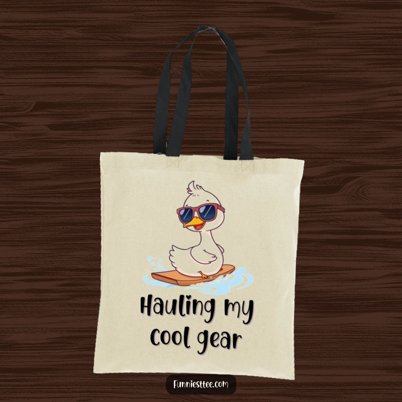 Funny goose in oversized sunglasses waterskiing backwards on a tote bag, a humorous and functional accessory for carrying essentials.